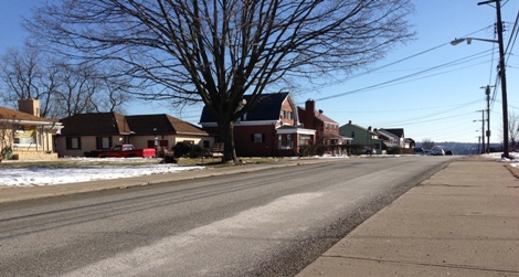Pleasant sidewalks and trees connect the community