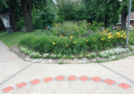 Baum Grove, with "Friendship" written in blocks within the sidewalk